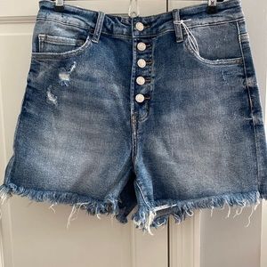 Lightly distressed medium was denim shorts